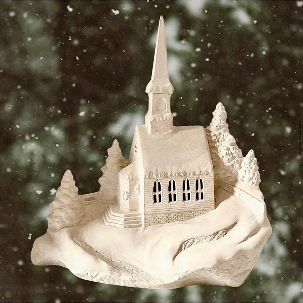 Beautiful white ceramic Christmas village church